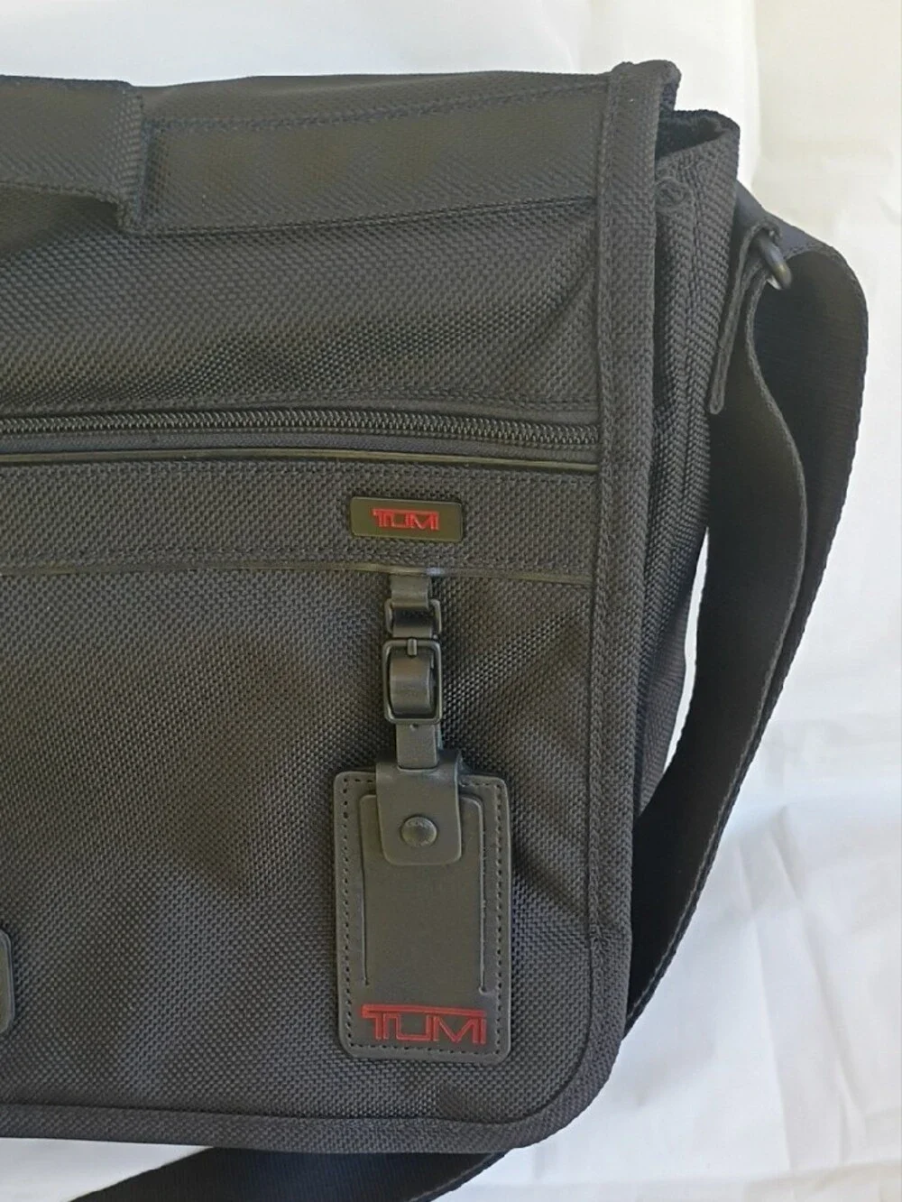 Tumi Black Nylon Messenger with Red Logo Accent